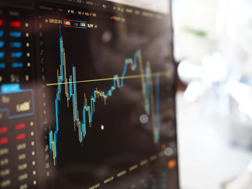 Stock market ticker on a slanted computer monitor