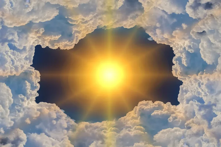 Sun shining through clouds and greenhouse gases
