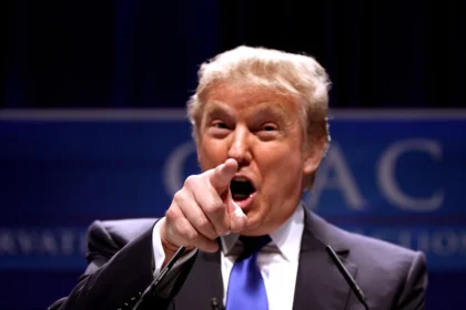 Donald Trump pointing as he speaks at CPAC