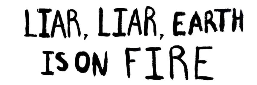 Climate protest sign about lying in politics