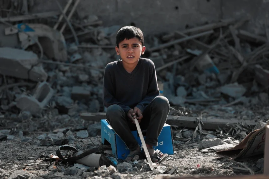 Rats are biting babies in gaza. A child sitting in the rubble.