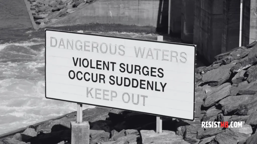 Sign warning about violent surges as a metaphor for violent rhetoric