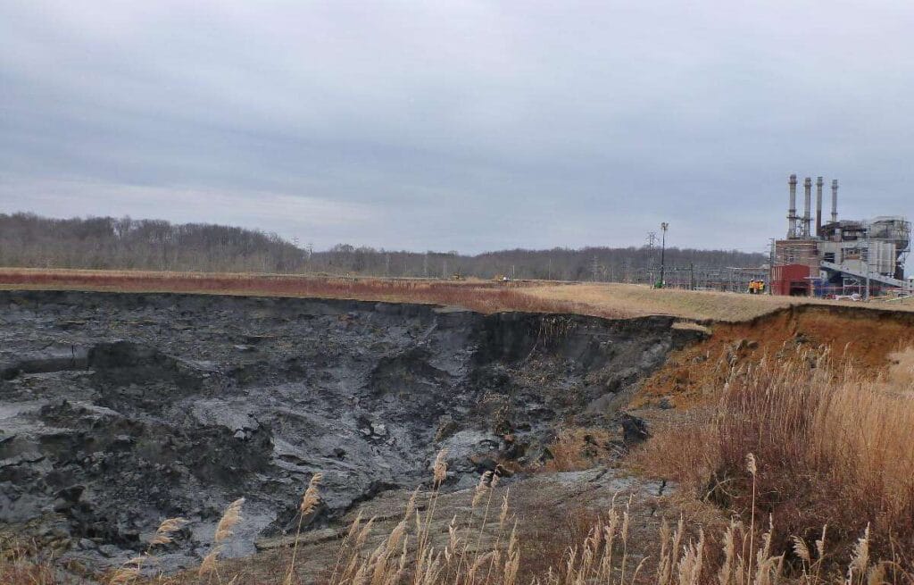 dan river coal ash spill 1 View of collapsed coal ash impoundment and closed power plant at dan river steam station (duke energy), eden, north carolina. The impoundment failure caused the 2014 dan river coal ash spill.