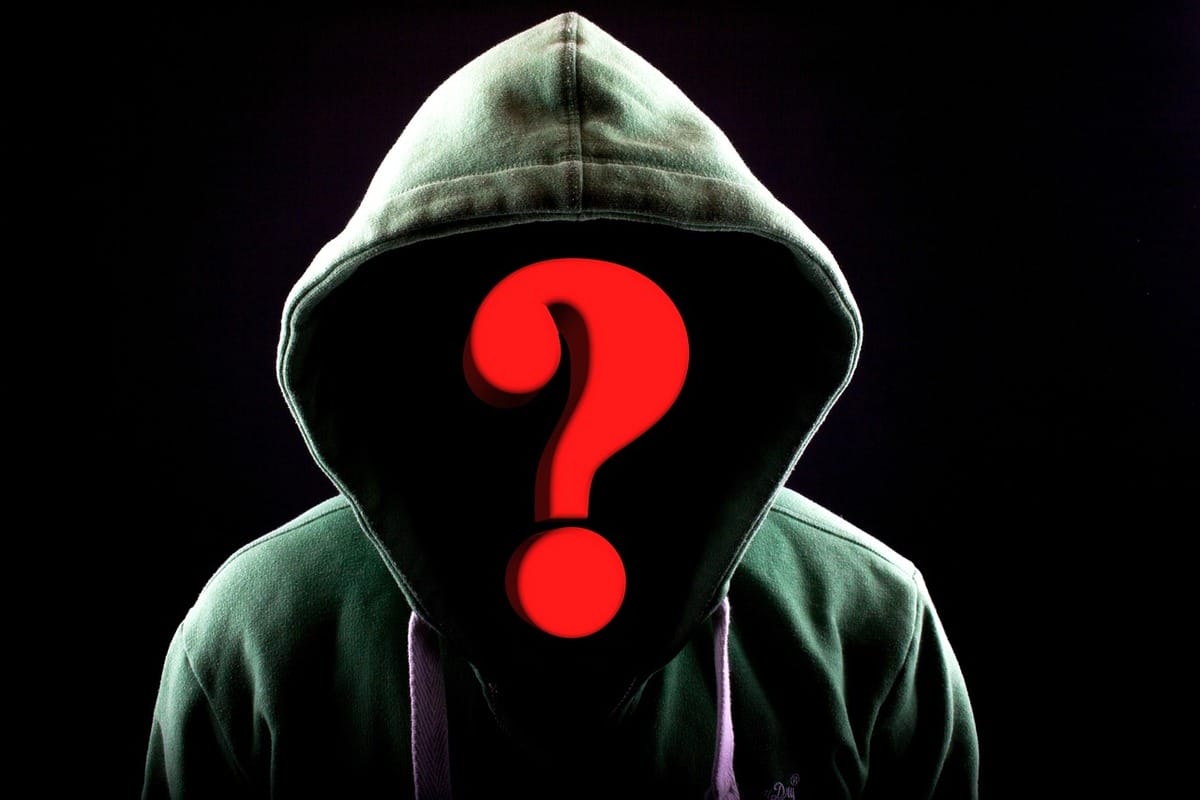 geralt who is it Person in a hoodie with a red question mark hiding their face. Stop the harassment