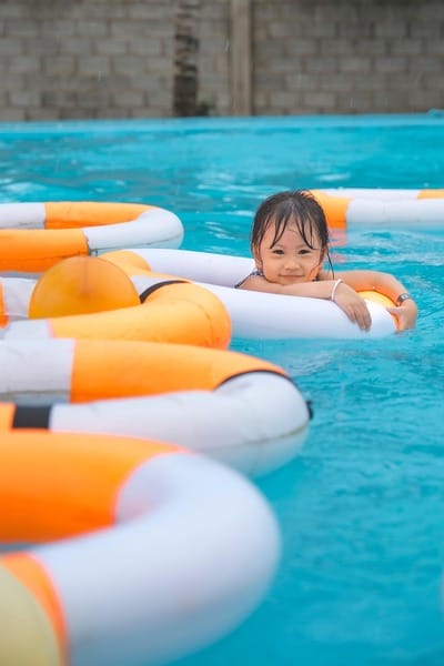 girl in pool Racial disparities in drowning. A girl in a pool using a floatie