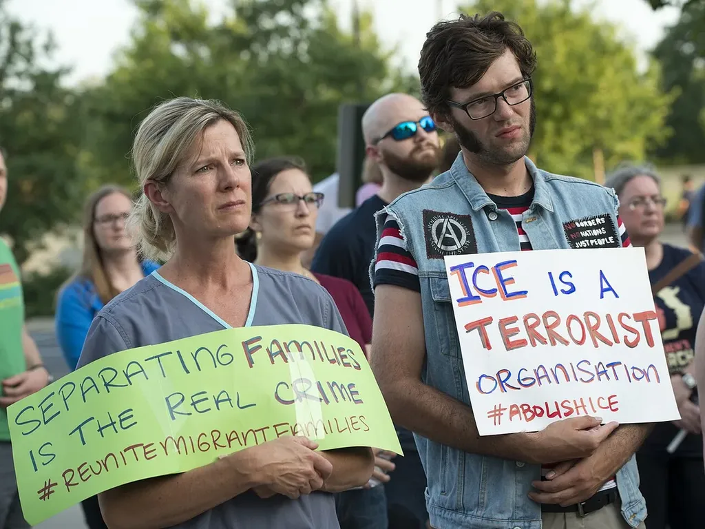 Ice protest family separation sign effects of mass deportation on kids