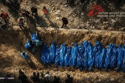 Painting of an Al Jazeera video screenshot showing 100 dead Palestinians being buried in a mass grave in Khan Younis.
